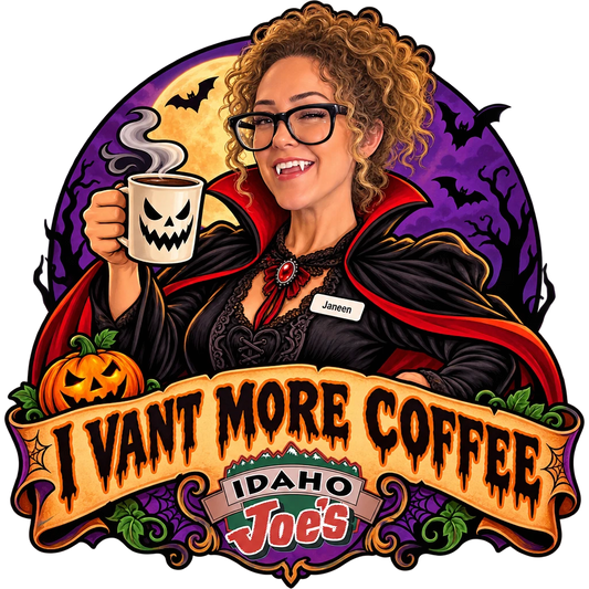 Idaho Joe's sticker: Janeen dressed as a vampire raising a jack-o'-lantern coffee mug – “I Vant More Coffee”