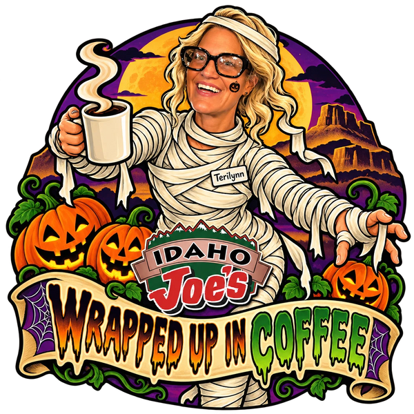 Idaho Joe's sticker: Terilynn dressed as a mummy holding a coffee mug – “Wrapped Up in Coffee”